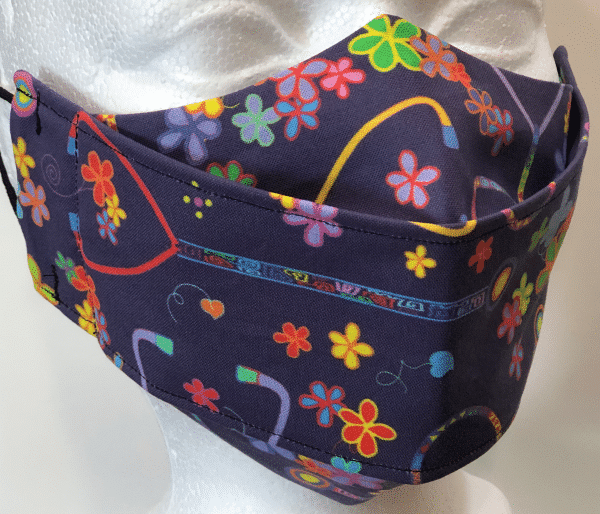 Multi-coloured flowers and stethescopes on purple Mask