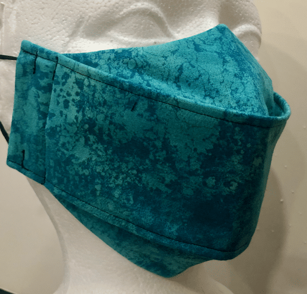 Green with light and dark green marbled pattern mask