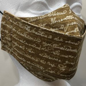 Cream Cursive text on a peanut base mask