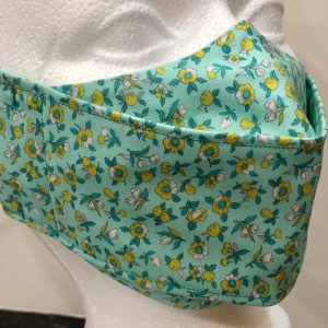 Light Sea Green base with yellow and white flowers and buds mask