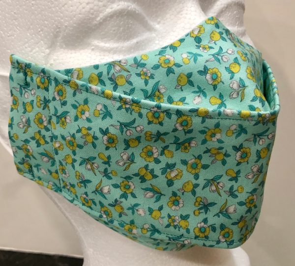 Light Sea Green base with yellow and white flowers and buds mask