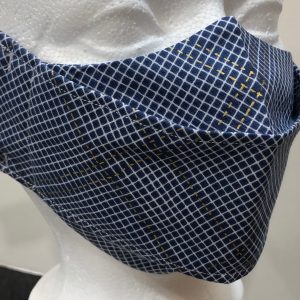 White diagonal grid with gold lines interspersed on navy blue mask
