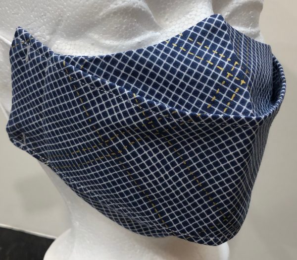 White diagonal grid with gold lines interspersed on navy blue mask